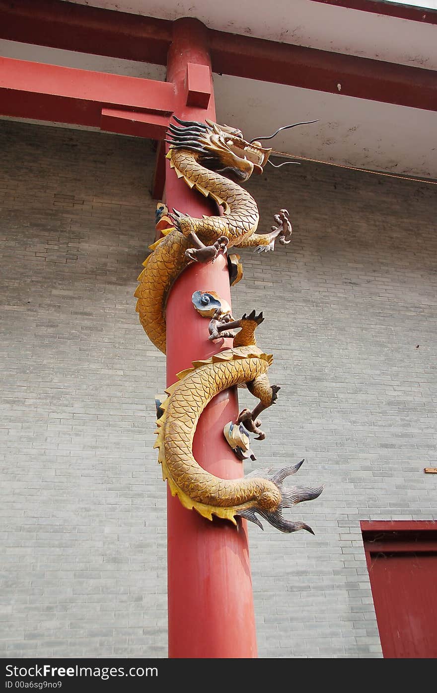 Ornament on pillar depict a dragon. Ornament on pillar depict a dragon