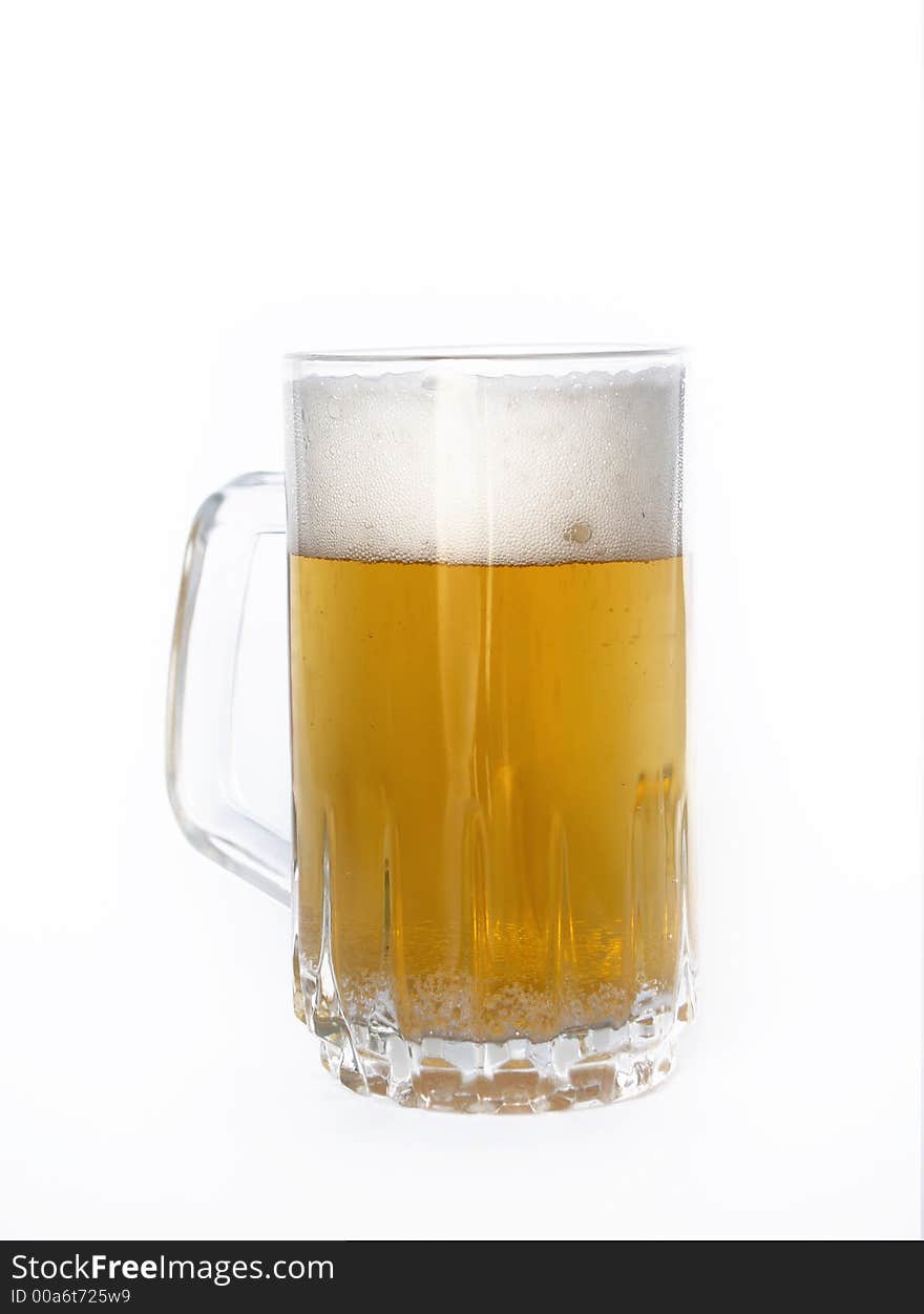 Full mug of beer over white. Full mug of beer over white