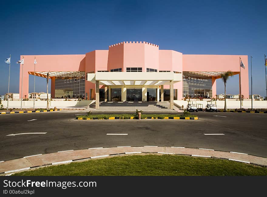 Front entrance in hotel and road before him