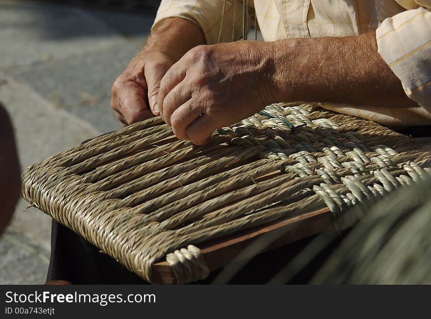 Closeup of man handmaking a chair. Closeup of man handmaking a chair