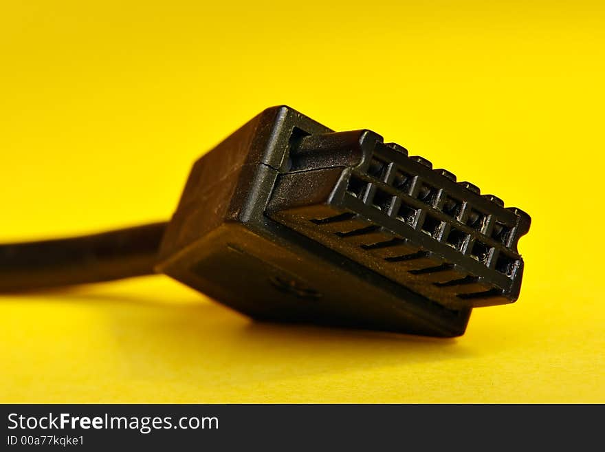 Game Console Cable on Yellow Background