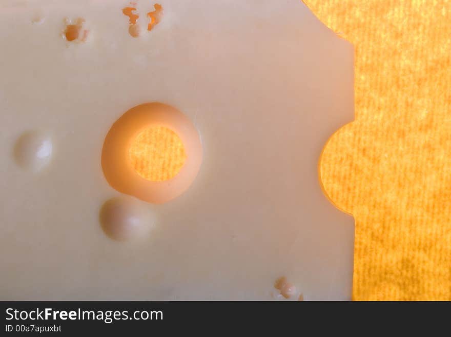 Yellow cheese with holes