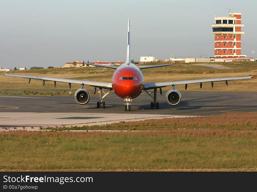 Commercial aircraft with a red nose