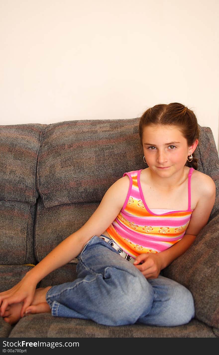 Girl sitting on the couch/sofa