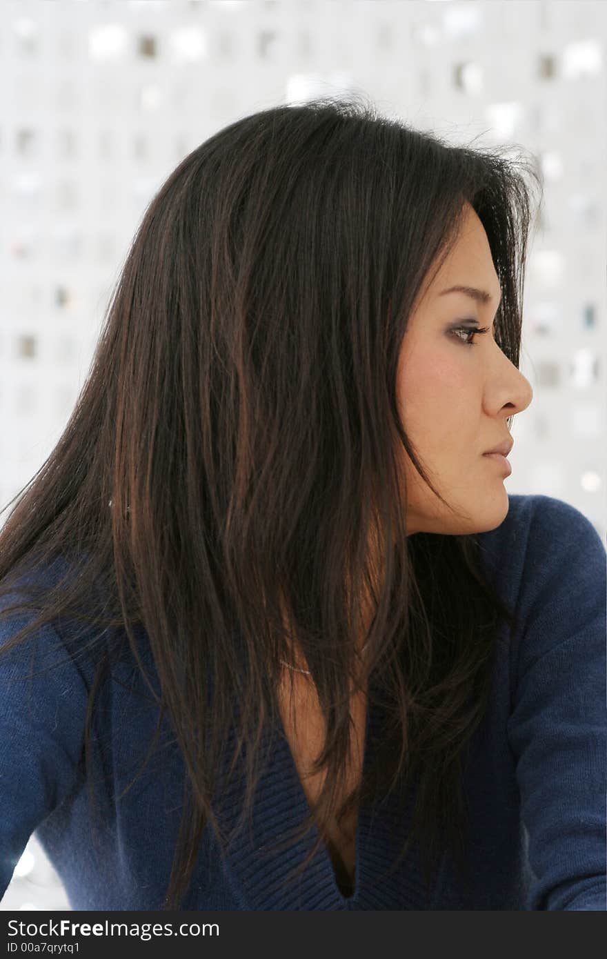 Studio shot of japanese woman looking sideways. Studio shot of japanese woman looking sideways