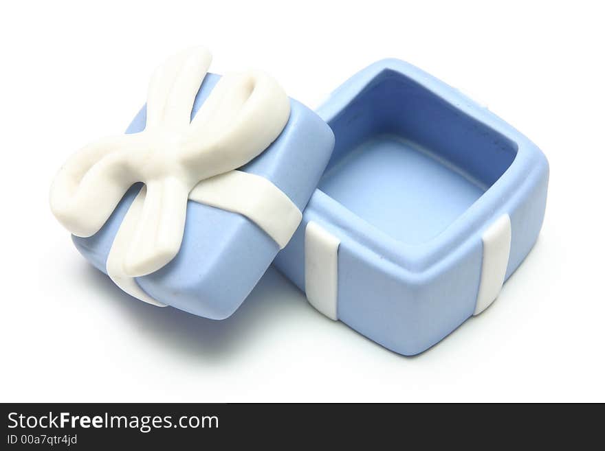 Blue Porcelain Gift Box with White Ribbon against white background