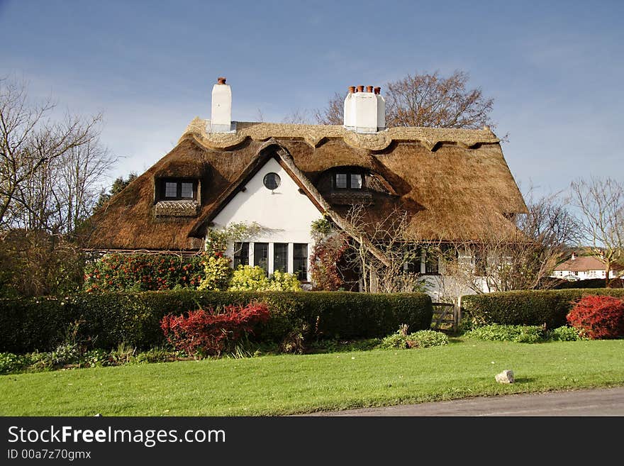 Thatched Cottage in a Rural Village in England. Thatched Cottage in a Rural Village in England