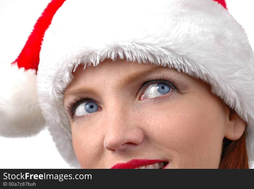 Portrait of woman wearing Santa's hat with white background