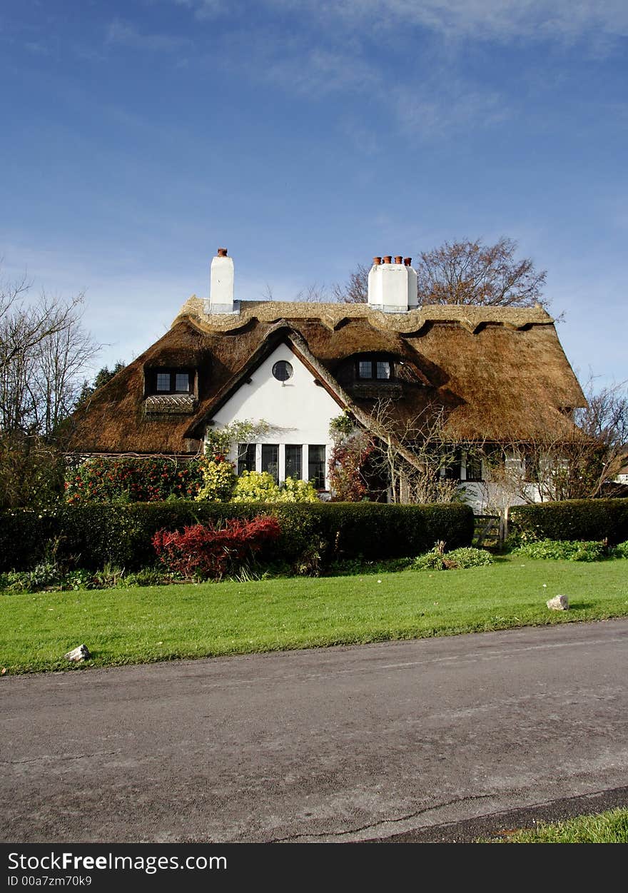 Thatched Cottage in a Rural Village in England. Thatched Cottage in a Rural Village in England