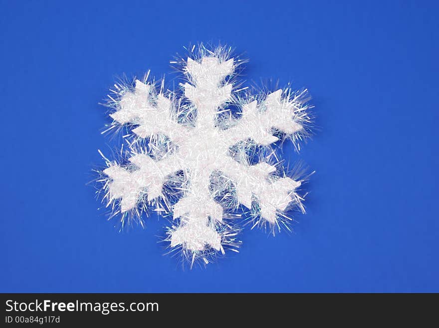 White Snowflake on blue background