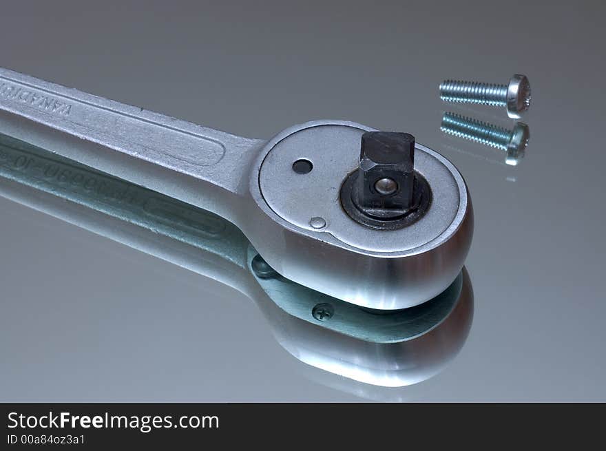 Wrench on a reflecting surface