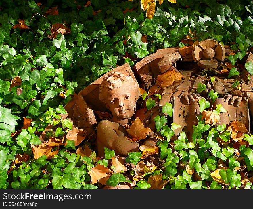 Architectural Detail of fallen cherub from facade of Brooklyn building