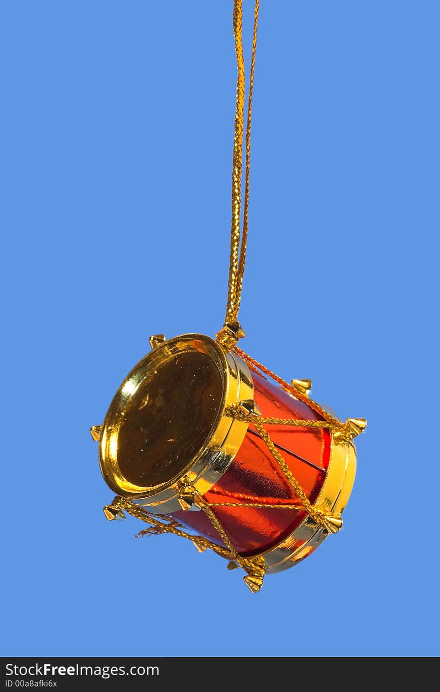 Photo of a drum on blue background