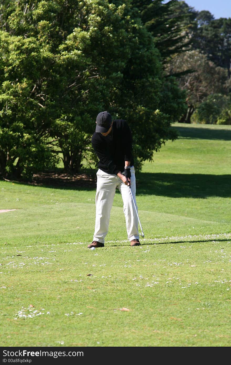 Golfer doing a practice swing