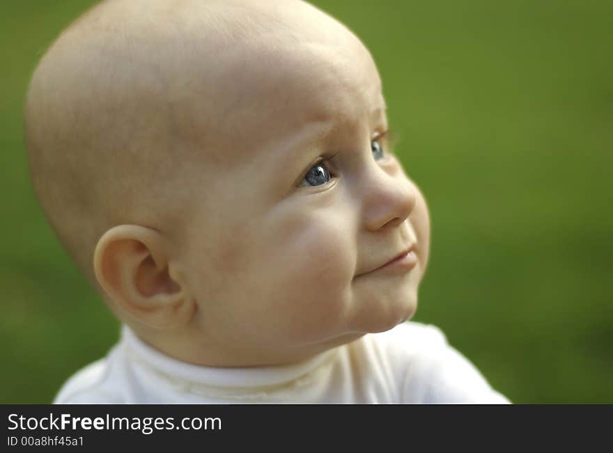 Profile of a baby outside. Profile of a baby outside