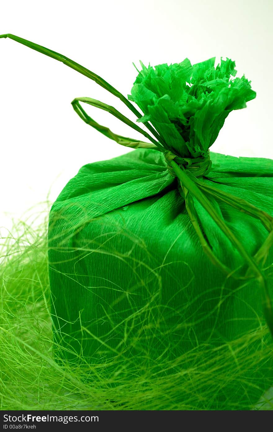 Green present with green ribbon.Present box. Green present with green ribbon.Present box.