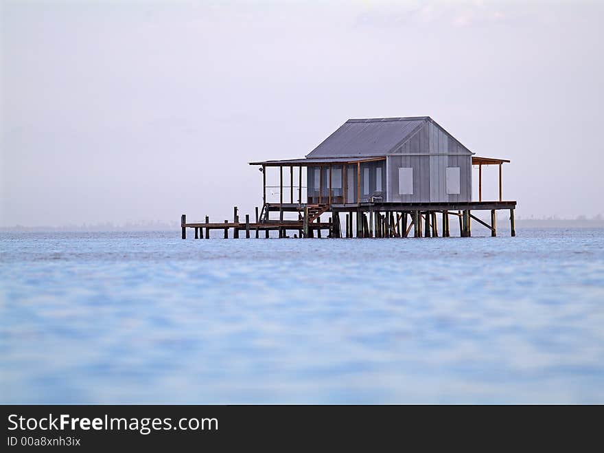 Fish house out in the bay.