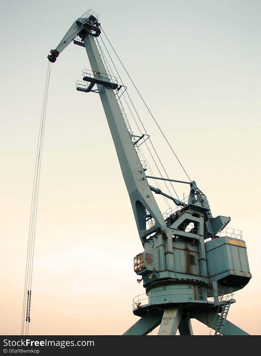 The large gray iron crane