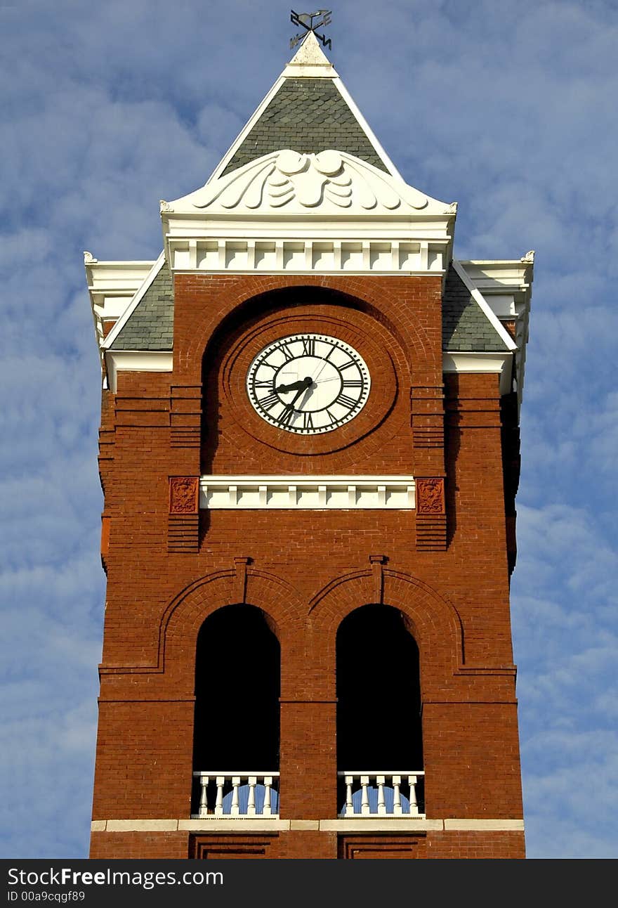 Clock tower on old courthouse building in rural southern city. Clock tower on old courthouse building in rural southern city