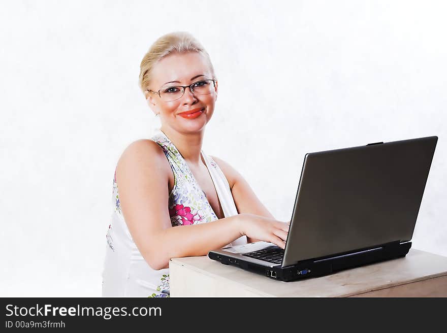 Business woman working with notebook. Business woman working with notebook