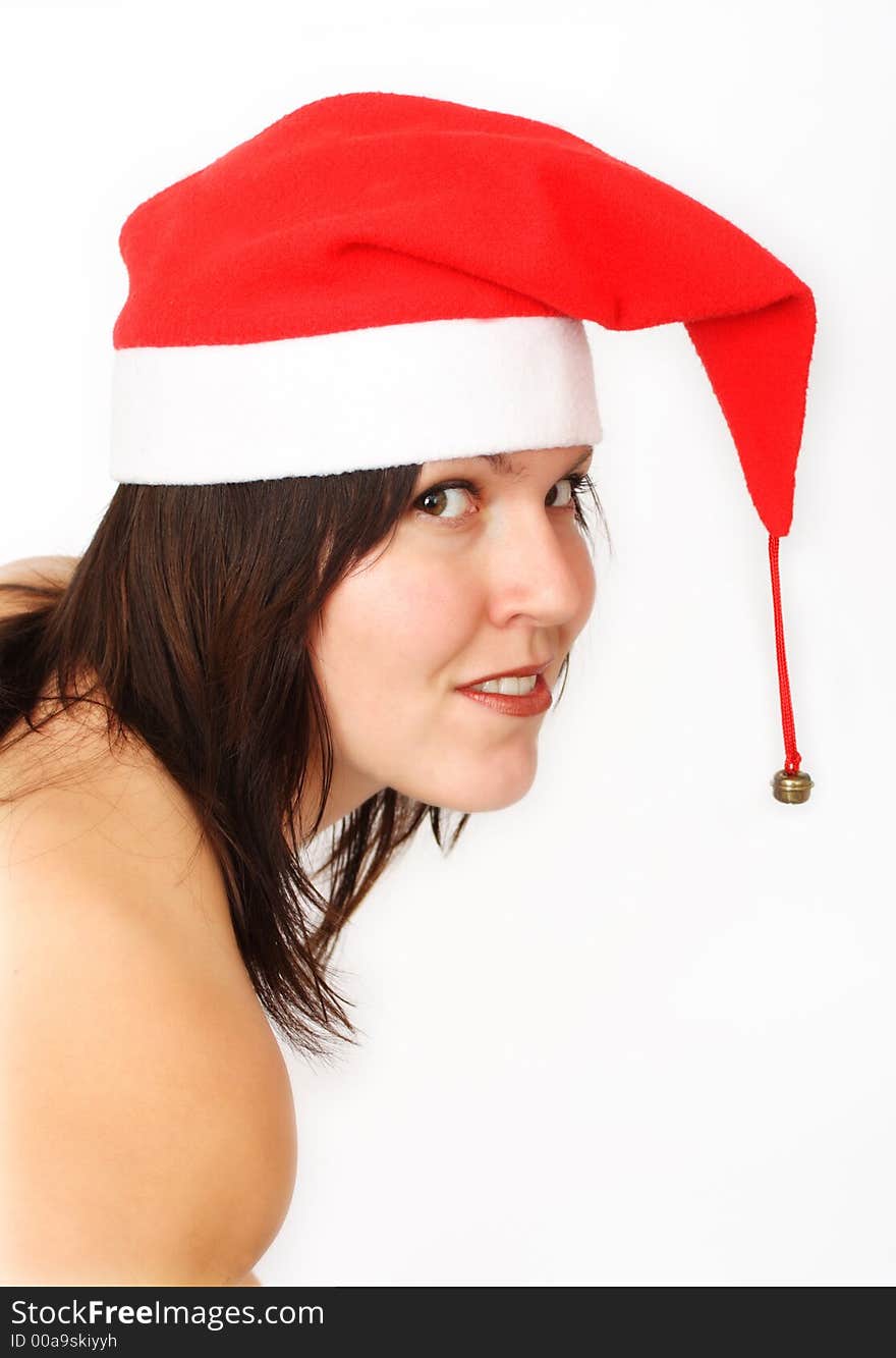 Girl in santas hat isolated on white backgroun