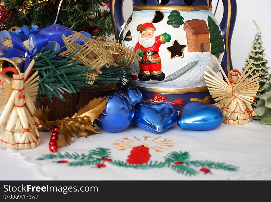 Christmas decoration with blue candle  and hearts