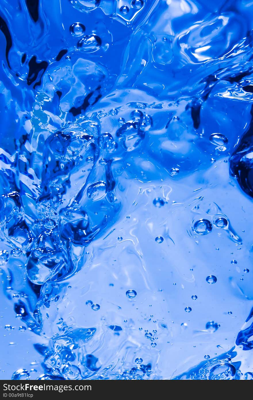 The blue water splash as abstract background