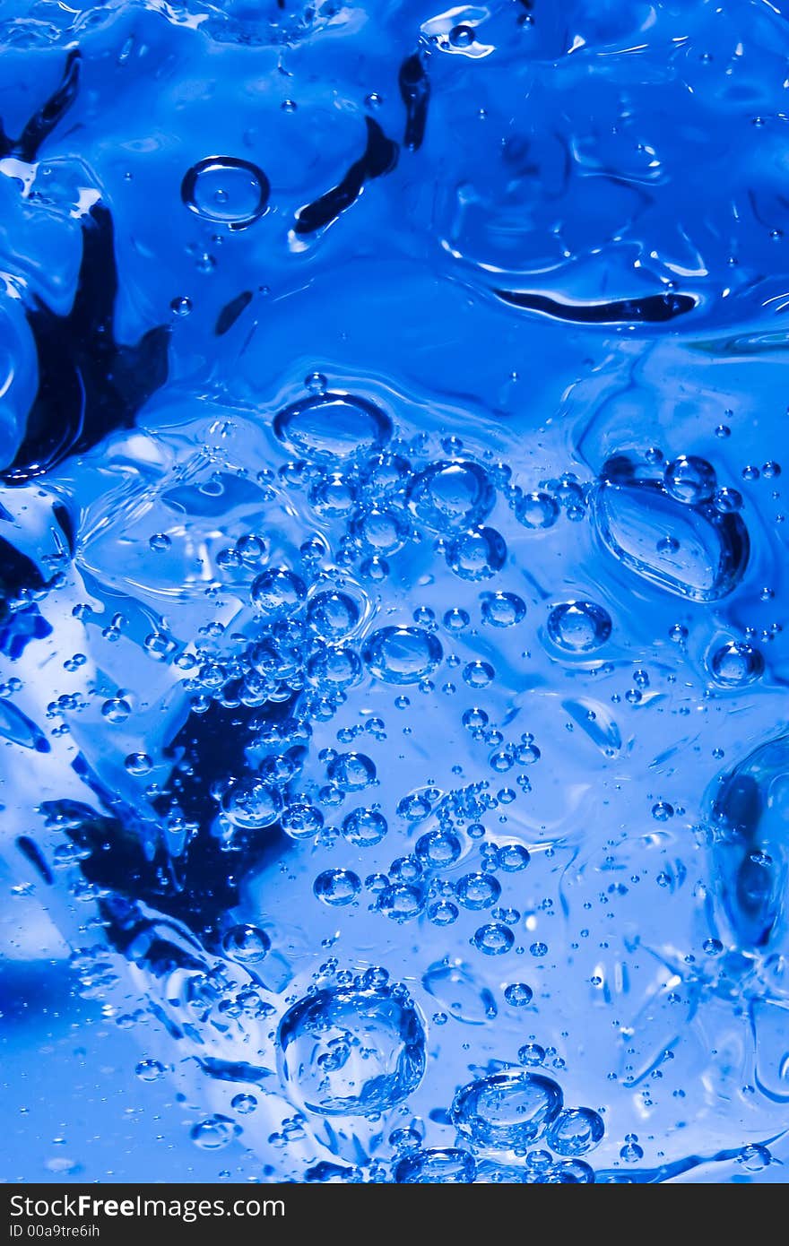 The blue water splash as abstract background