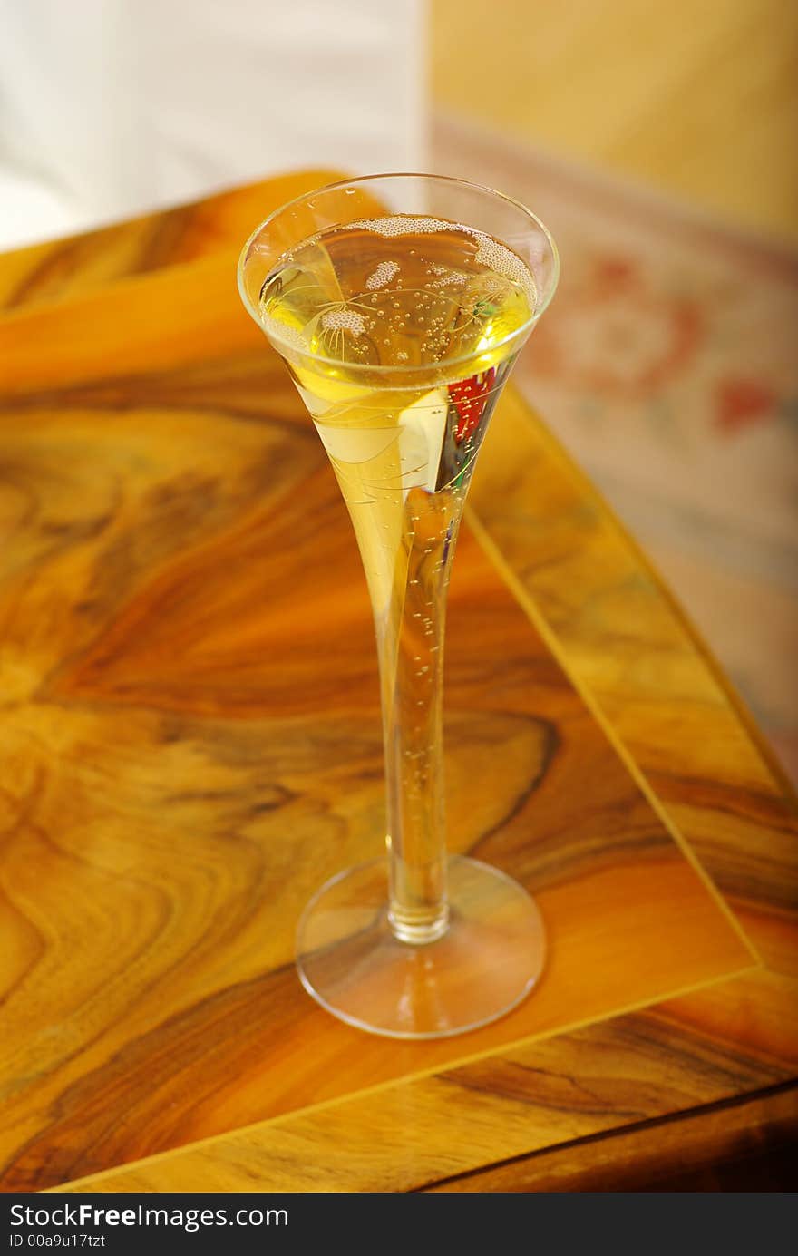 Champagne in glass on table