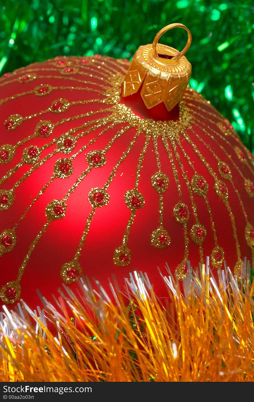 Christmas decoration on silver tinsel background