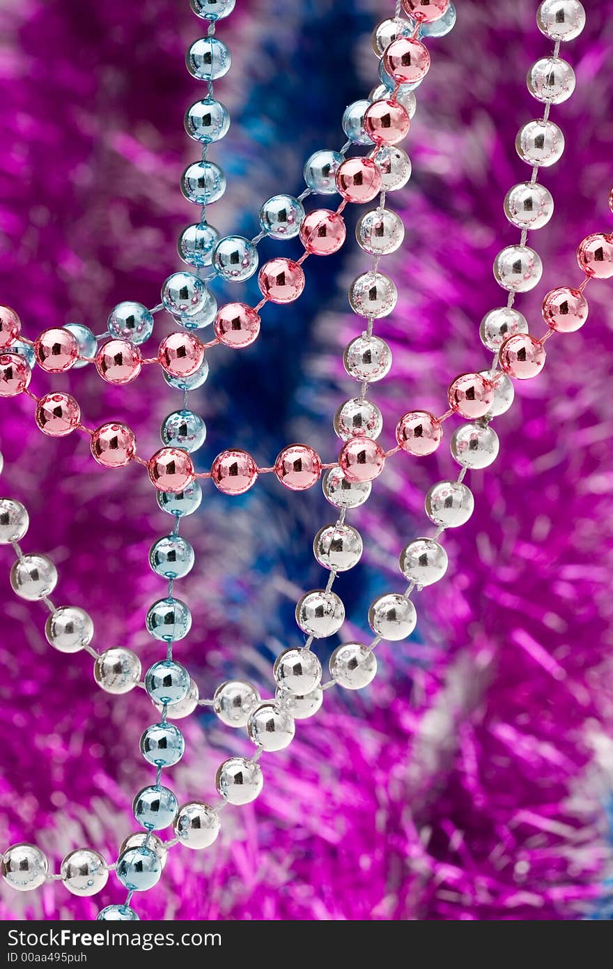 Christmas decoration on the color tinsel background