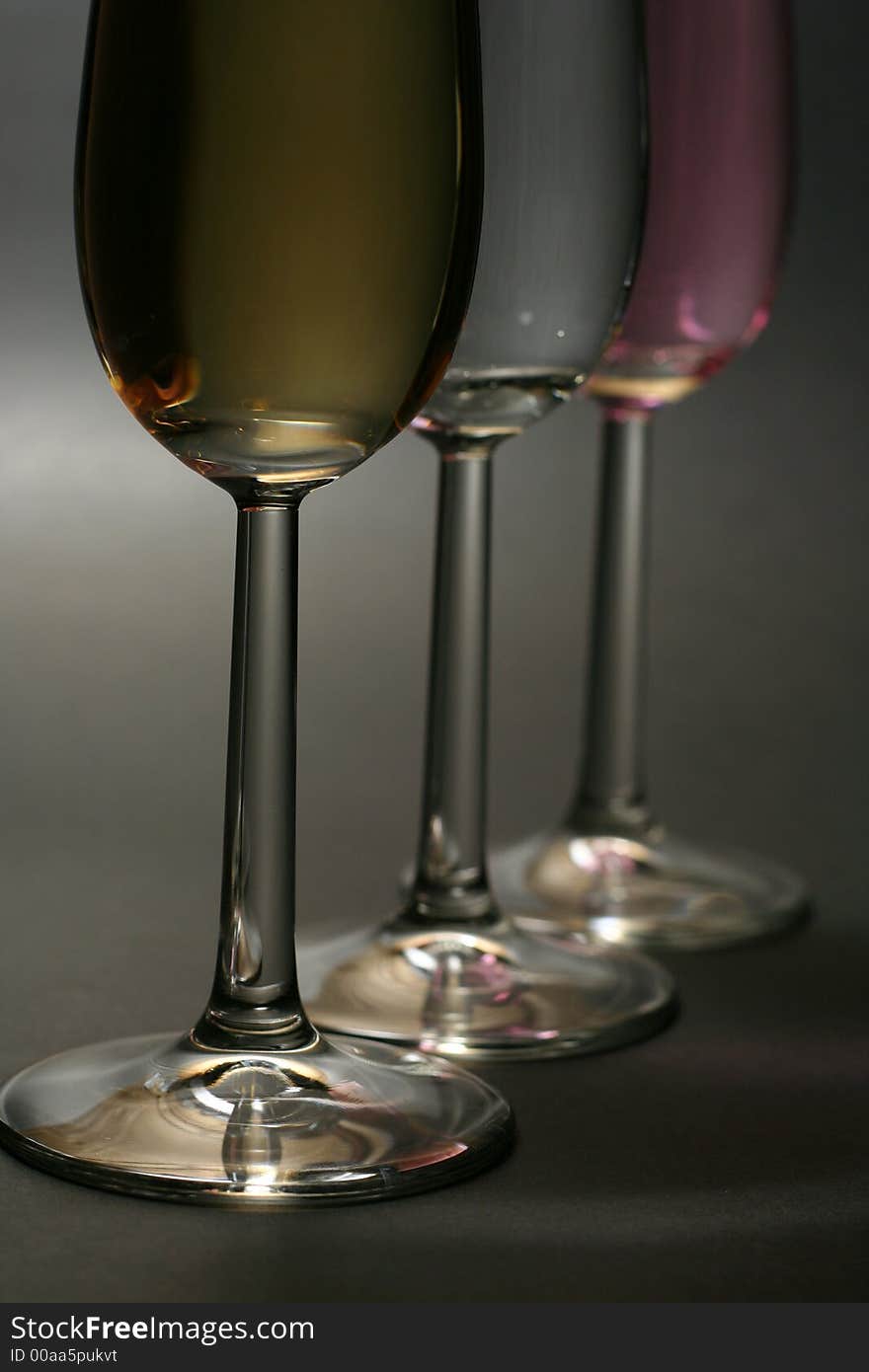 Vertical close up of champagne glasses