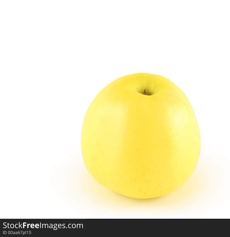 Yellow apple isolated on white