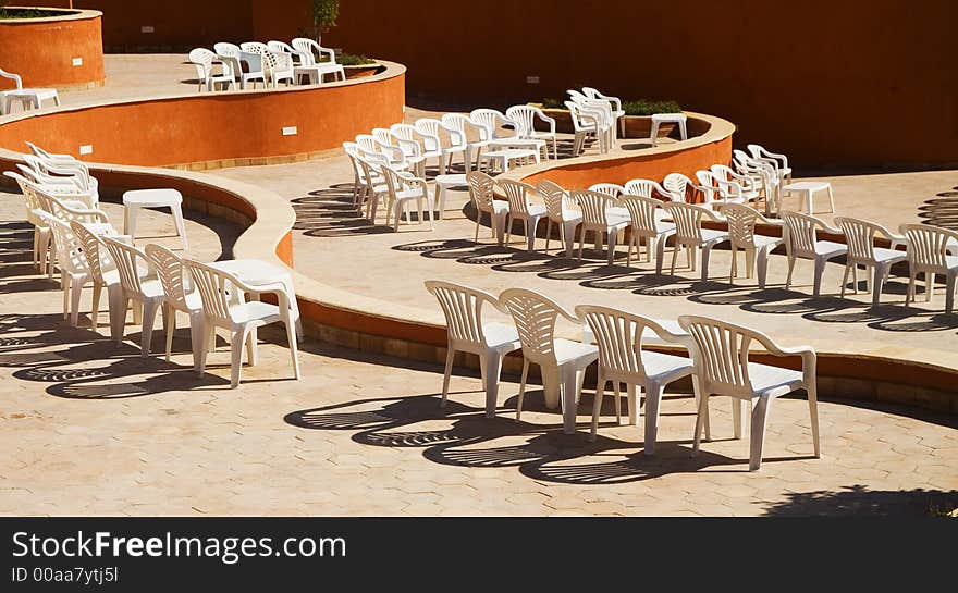 Plastic chairs in the amphitheatre