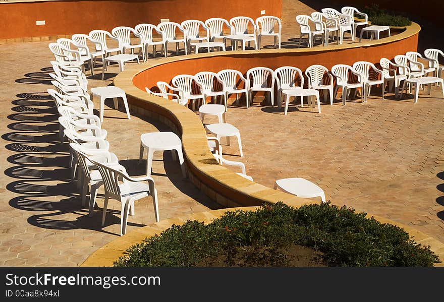 Plastic Chairs In The Amphitheatre