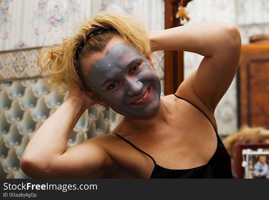 Funny woman with the cosmetic mask. Funny woman with the cosmetic mask