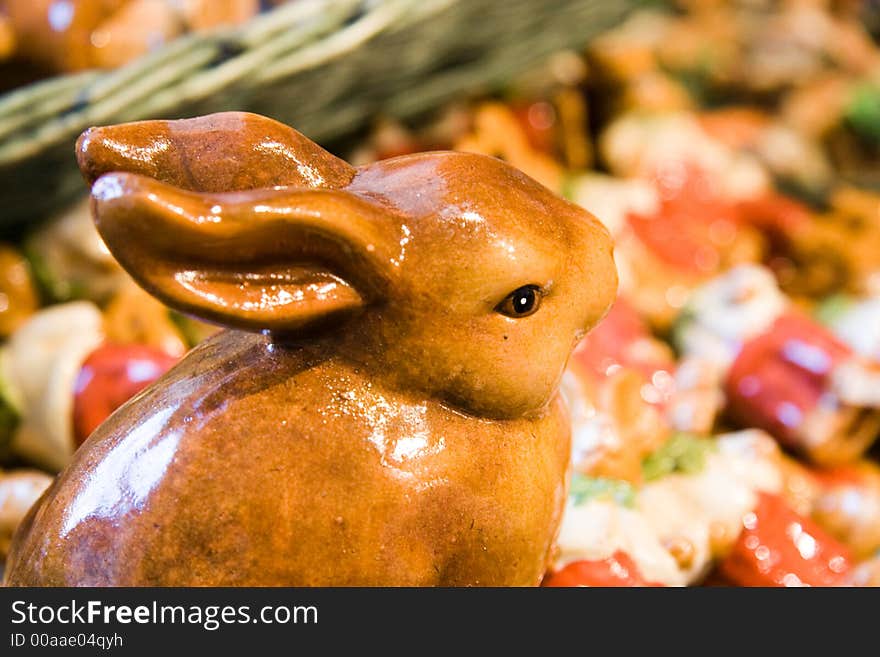 A decorative easter rabbit in ceramics with background