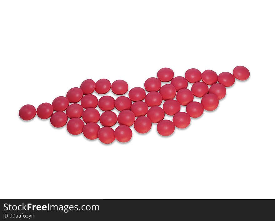 Magenta tablets lips isolated on white with clipping path. Magenta tablets lips isolated on white with clipping path