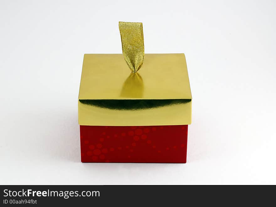 Red and gold closed gift box. Red and gold closed gift box