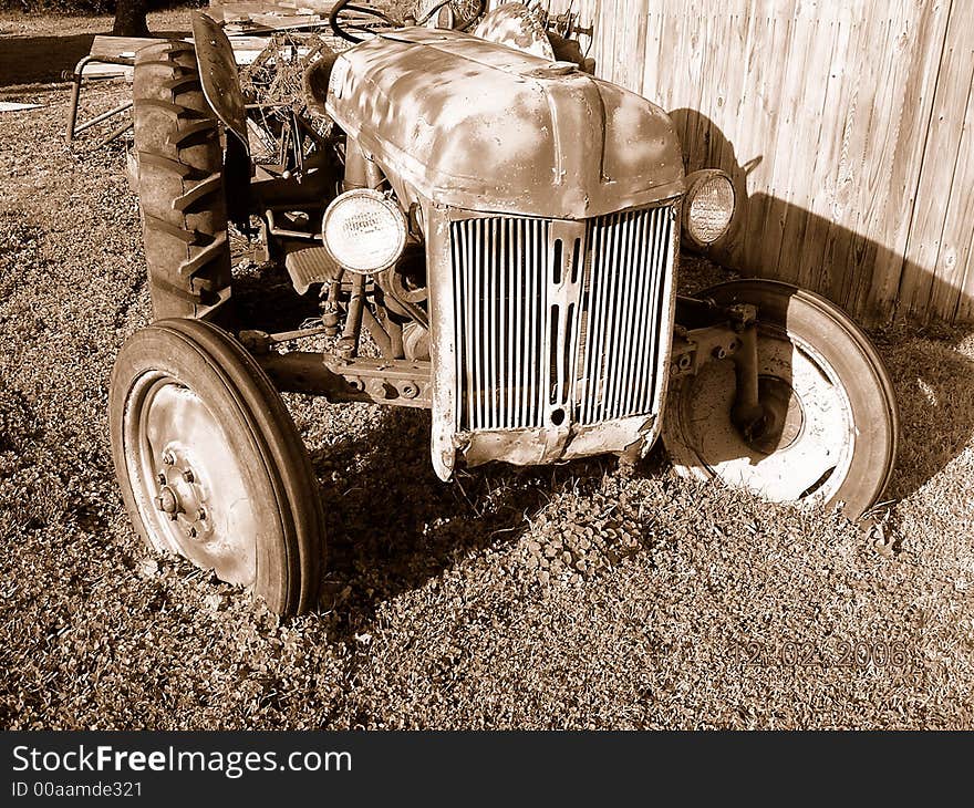 A once new tractor but now left to rust. A once new tractor but now left to rust.