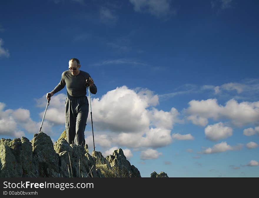 Men going up along rock. Men going up along rock