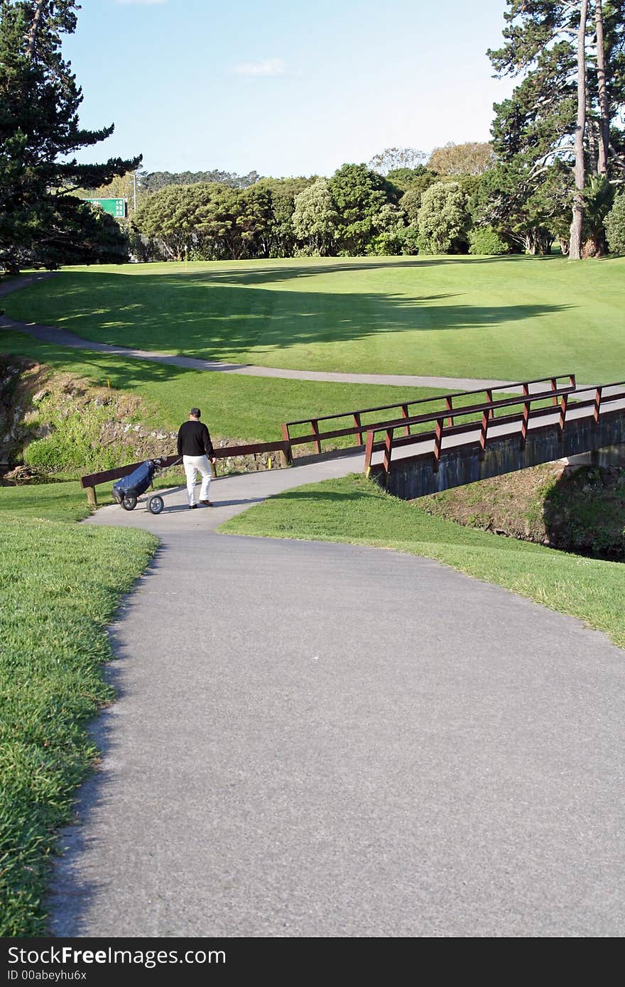 Golfer walking