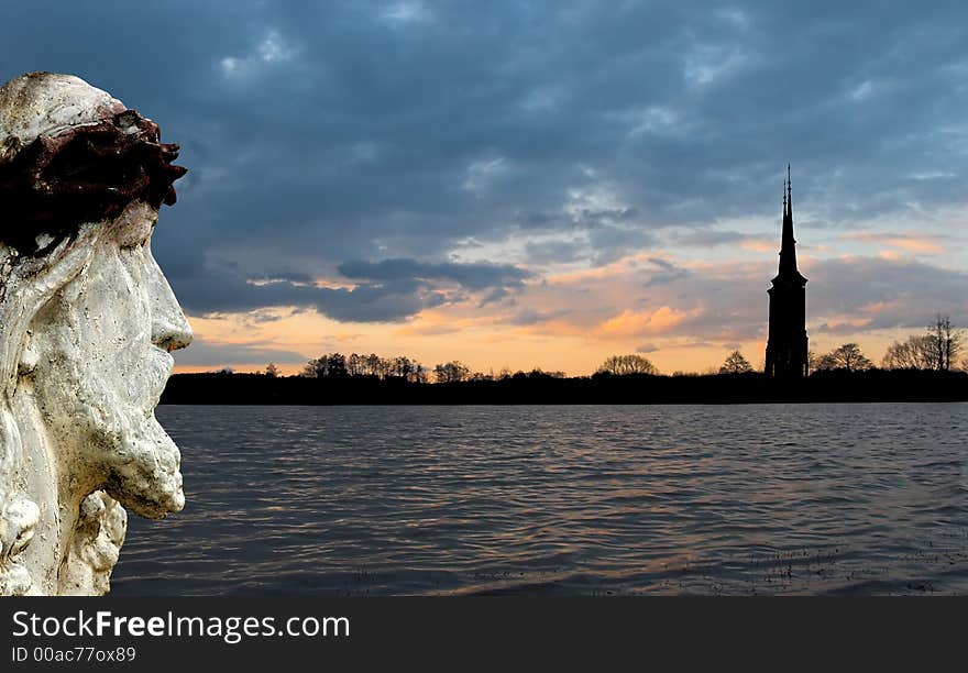 Statue of Jesus against sunset sky. Statue of Jesus against sunset sky