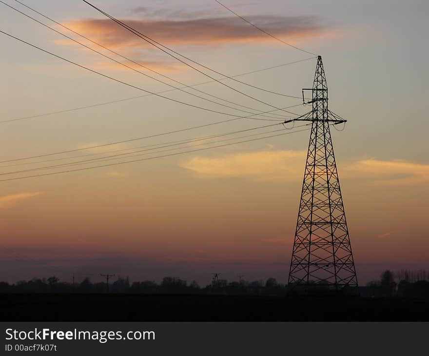 Pillar of high voltage about sunset, silhouette. Pillar of high voltage about sunset, silhouette