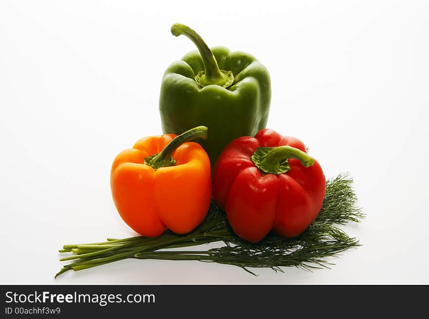 Three multi-coloured sweet pepper