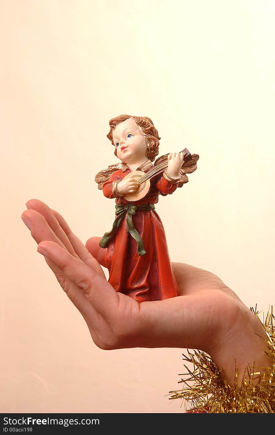 Christmas angel on open hand