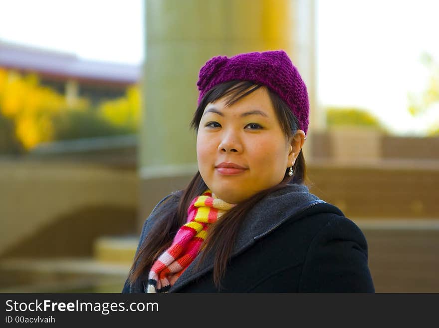 Happy young asian girl in winter clothes. Happy young asian girl in winter clothes