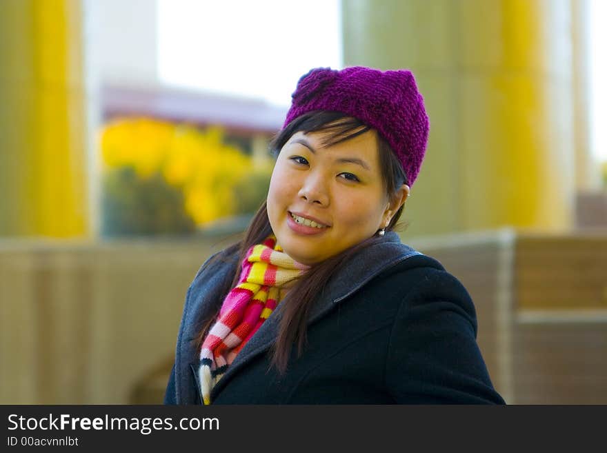 Happy young asian girl in winter clothes. Happy young asian girl in winter clothes