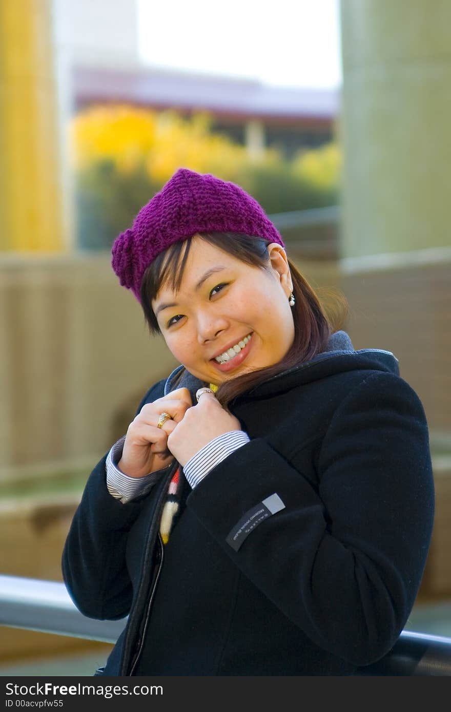 Happy young asian girl in winter clothes. Happy young asian girl in winter clothes