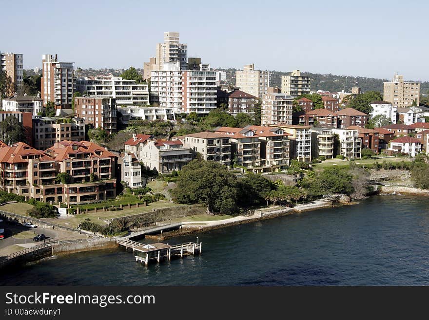 Buildings At The Sydney Harbour Coastline On A Summer Day, Australia. Buildings At The Sydney Harbour Coastline On A Summer Day, Australia